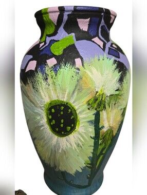 hand-painted  vase with floral design over bold colorful colorblock background